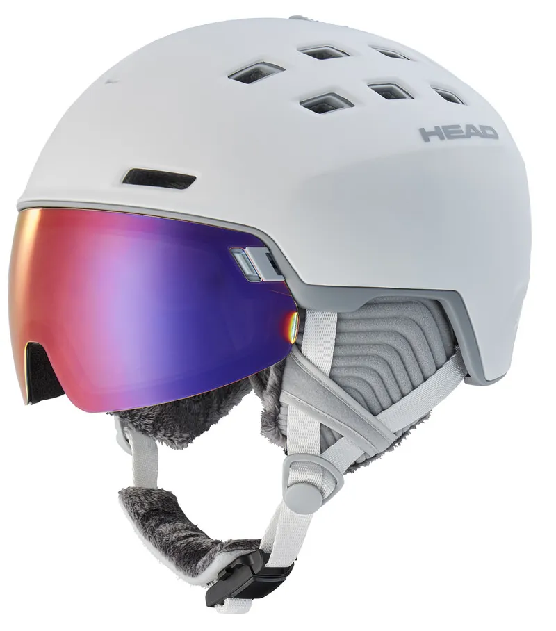 White Head Rachel 5K ski helmet with integrated, colored visor and chin strap. Ventilation openings at the top.