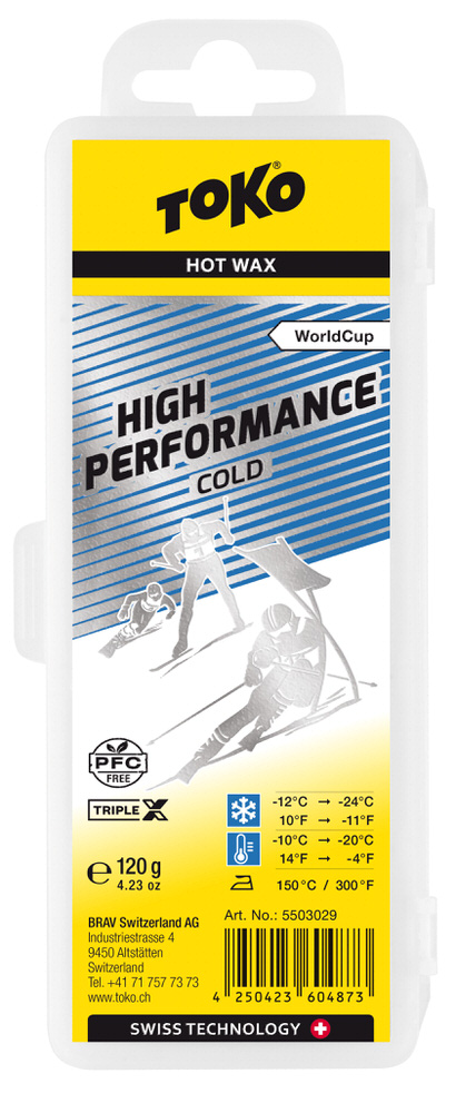 Verpackung Toko High Performance Triple X Cold Wachs, gelb-silber mit Skifahrer-Illustrationen und Temperaturangaben.