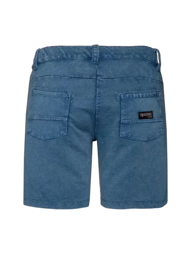 A pair of blue shorts, shown from the back, made of blue fabric with two patch square back pockets. A small, dark label with the white imprint "Protest" is attached to the right pocket.