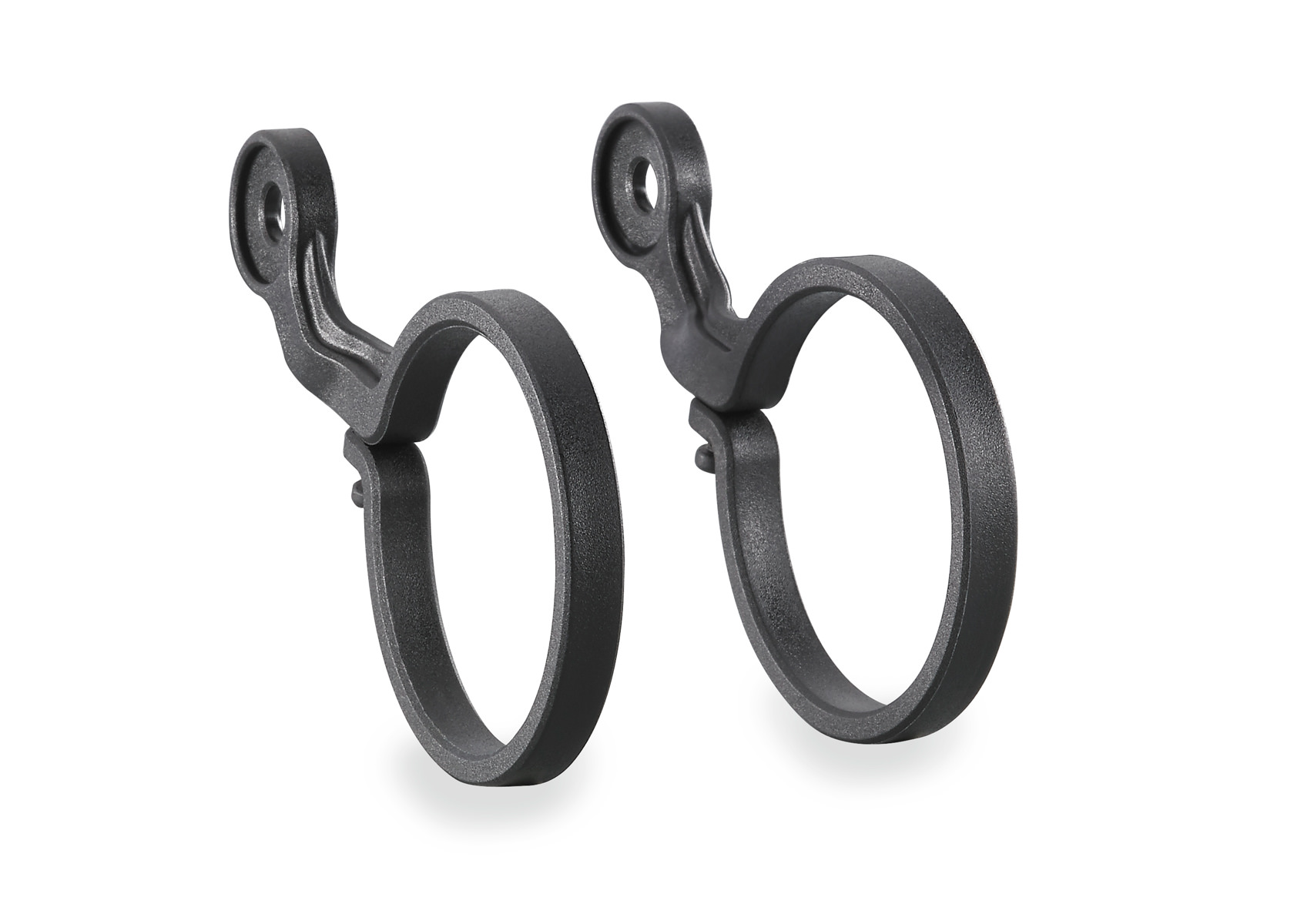 E-Bike Lenkerhalterungen Zwei Lenkerhalterungen aus schwarzem Kunststoff für E-Bike Beleuchtung, seitlich angeordnet.