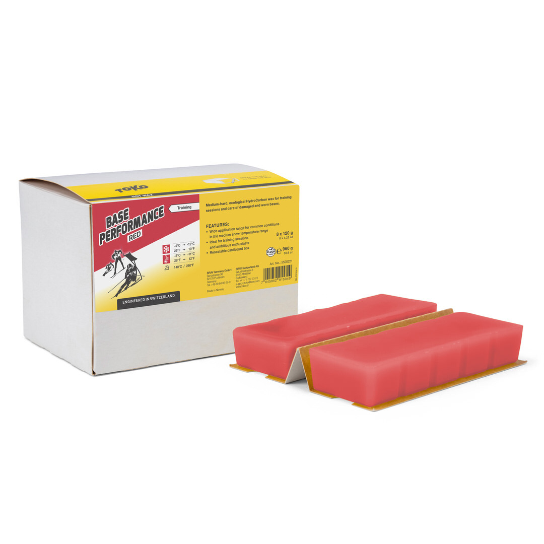 Verpackung Toko Base Performance Red Heisswachs mit zwei roten Wachsbarren.