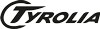 Tyrolia Logo Design Logo von Tyrolia in schwarzer Schrift. Das "T" ist stilisiert mit einer geschwungenen Linie um den Buchstaben.
