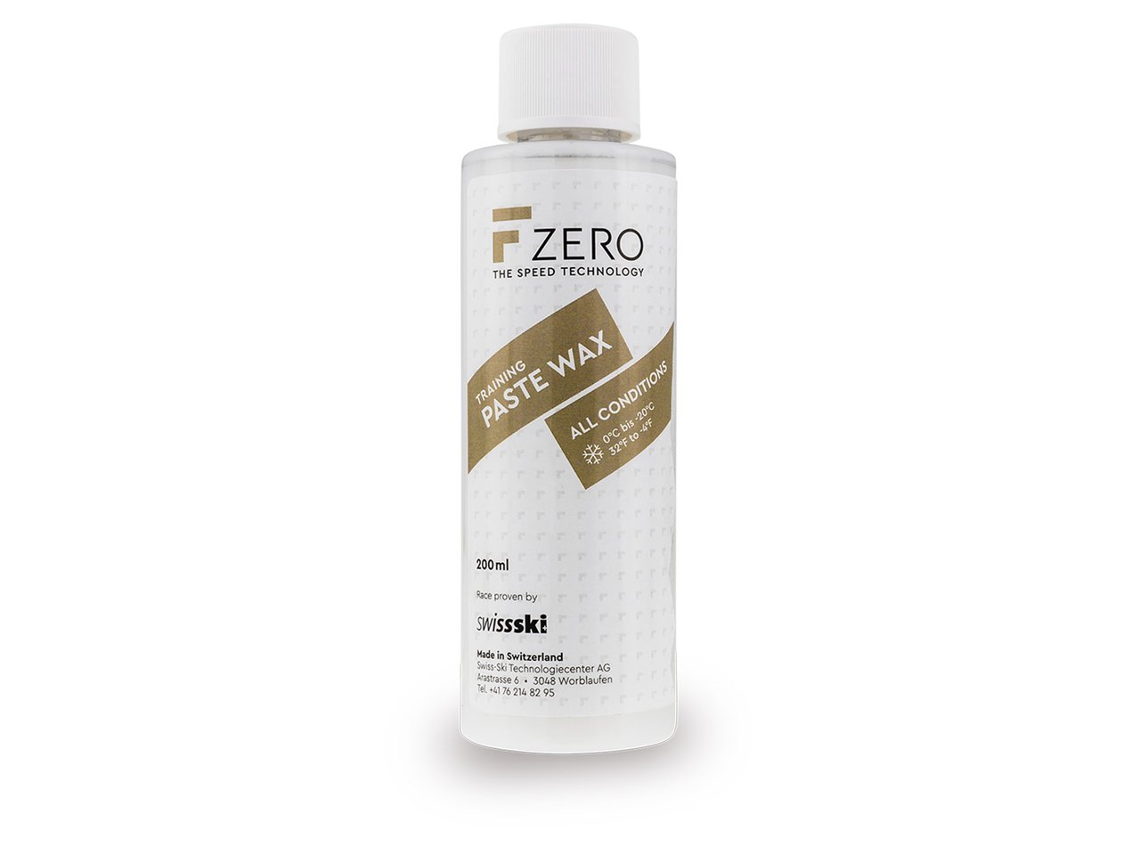 Weiße Flasche FZERO Training Paste Wax All Conditions mit goldfarbenem Aufdruck.
