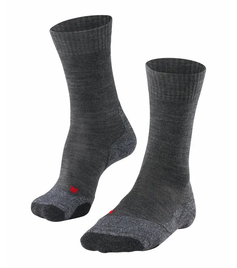 Gray TK2 women's trekking socks, medium length, with red logo detail.