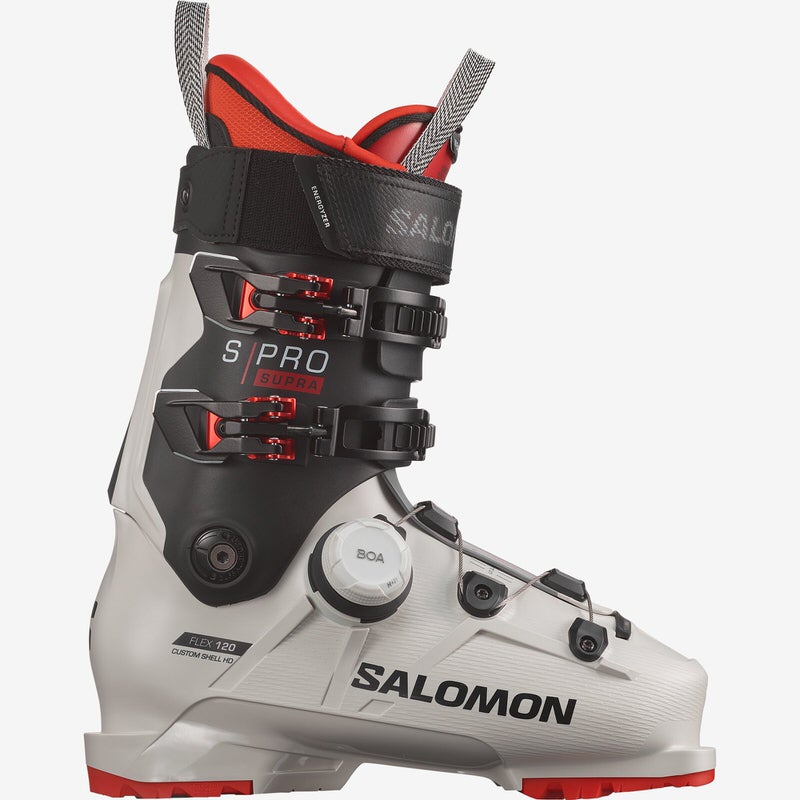 Weisser Salomon S/PRO Supra BOA 120 Skischuh mit schwarzem und rotem Innenschuh und BOA-Verschluss.