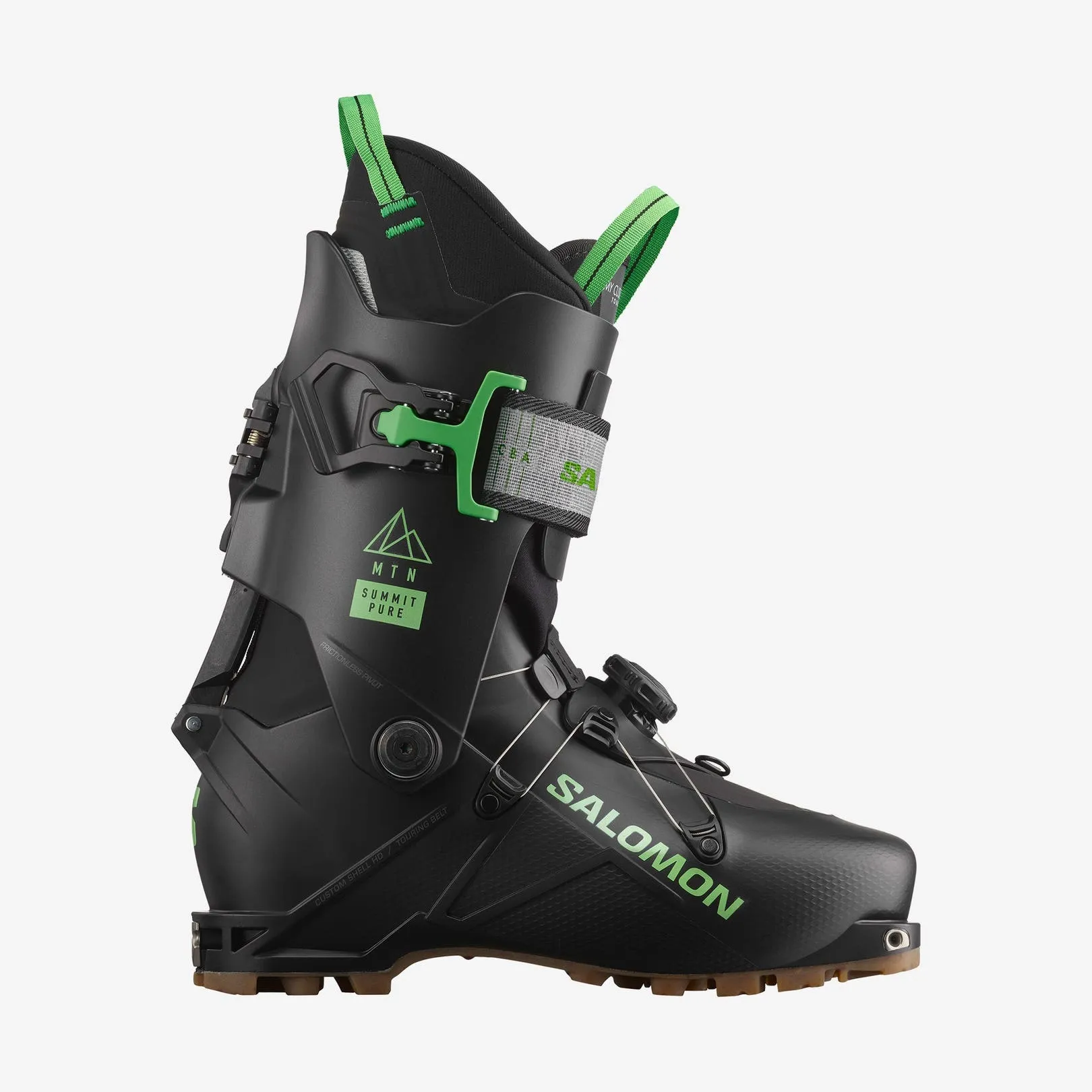 Black Salomon MTN Summit Pure touring ski boot from the side, with green accents and brown sole against a light background.