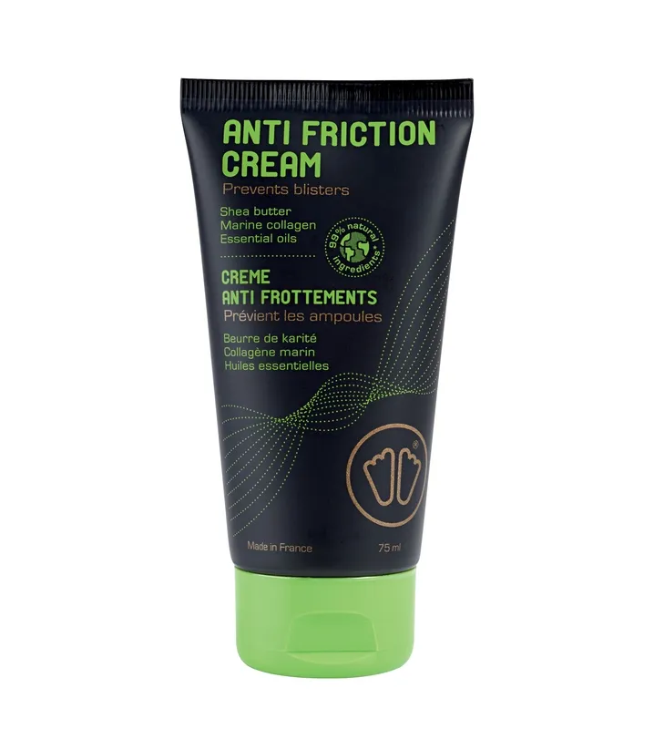 Tube foncé avec bouchon vert pour crème anti-frottement avec logo des pieds. Texte en anglais et en français.