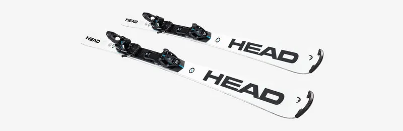 Des Head WCR e-SL Rebel FIS Ski blancs avec fixation Freeflex 14 montée, posés parallèlement sur un fond clair.