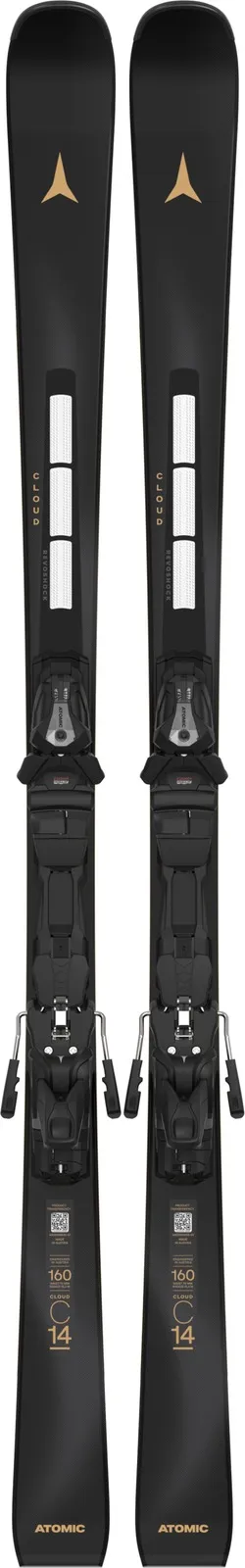 Two black Atomic skis with mounted bindings, arranged vertically with the tips pointing upwards. Golden accents and white stripes are visible.
