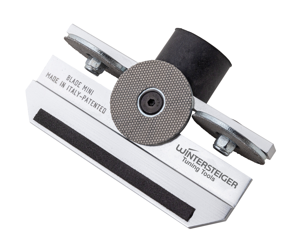 Das Jomax Blade Mini 600 Kantenschärfgerät, eine Nahaufnahme von Schleifscheiben und Werkzeugkörper.