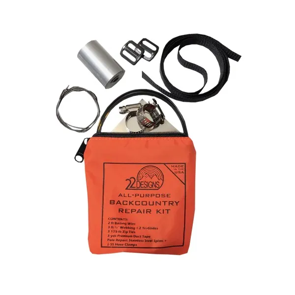 An orange "22 Design ALL-PURPOSE BACKCOUNTRY REPAIR KIT" set is shown open on a white background. Scattered around the bag are adhesive tape, 2 metal sliders, wire, webbing, hose clamps, and a metal splint.
