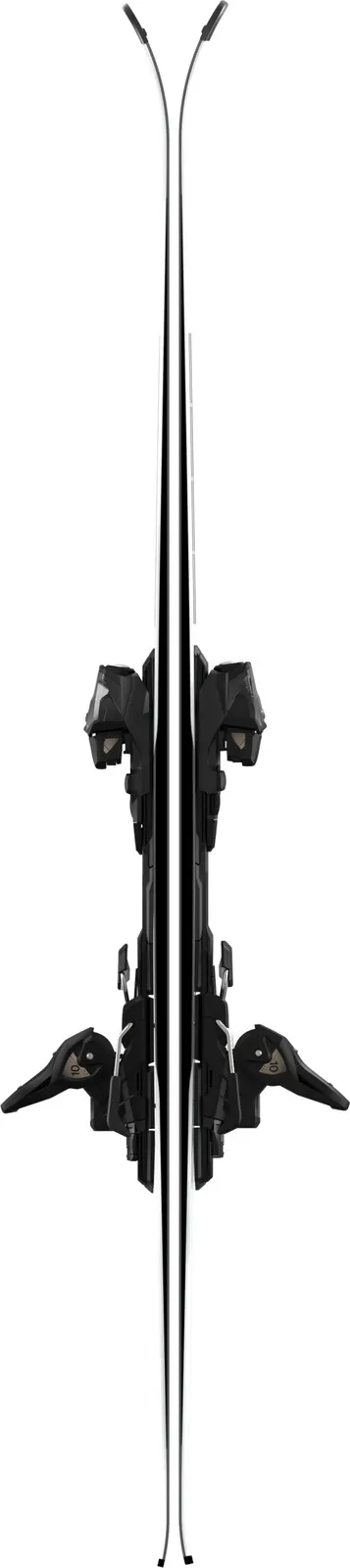Skis stand upright in the middle with black bindings. The skis have a white outer surface and a black inner surface.