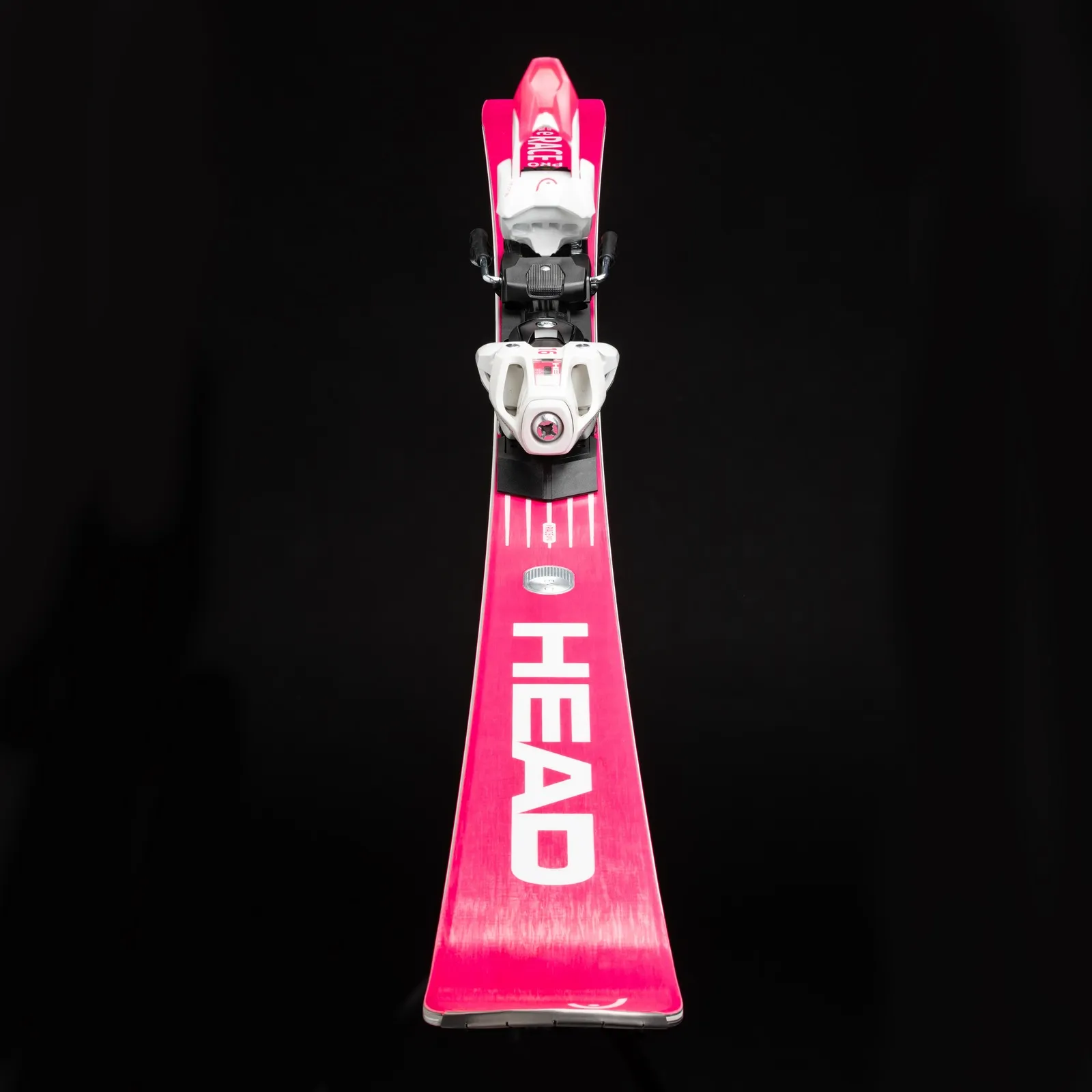 Head WC Rebels e-Race Pro Ski rose, vue de face, avec fixation blanche, sur fond noir.