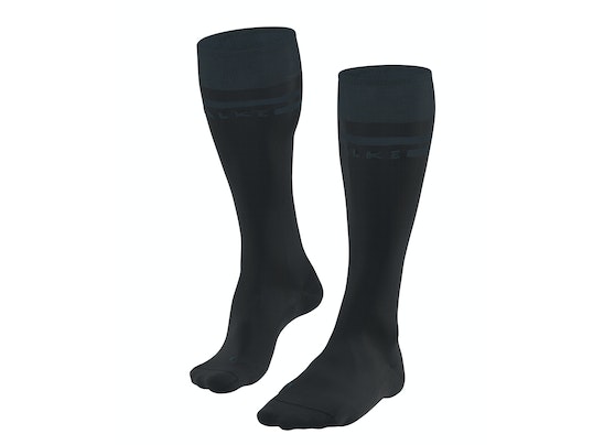 FALKE SK7 Chaussettes au genou Race Deux mi-bas noirs FALKE SK7 Race Skiing, vue de face, avec logo sur le haut de la tige.