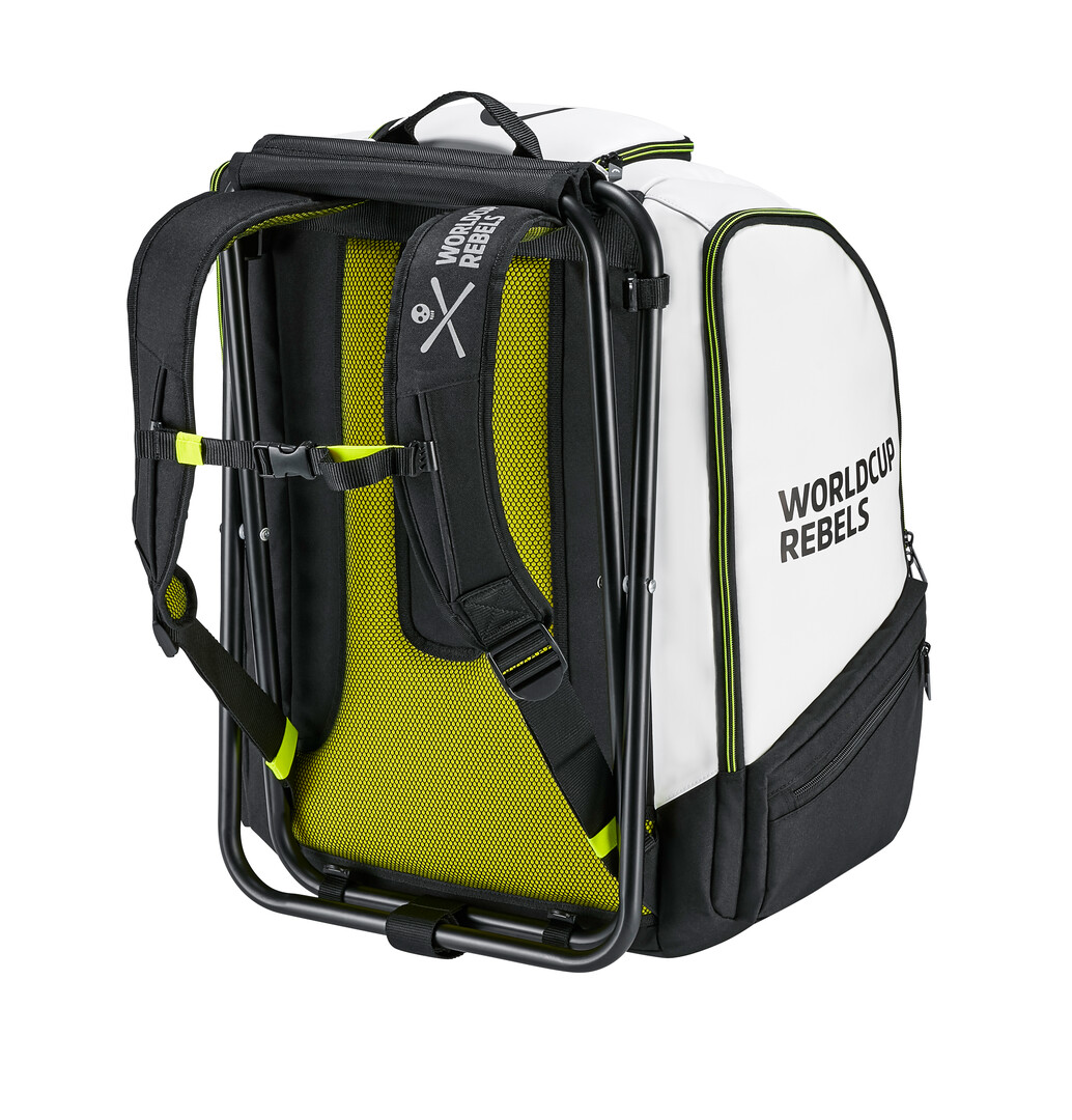 Head Rebels Coaches Backpack mit Stuhlgestell von hinten, weiß-schwarzes Design mit gelben Akzenten.