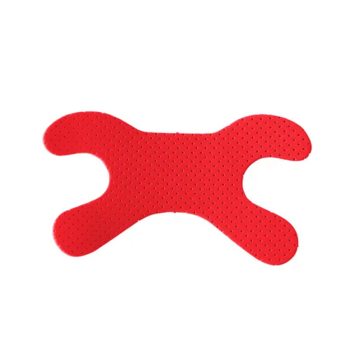 Roter, querformatiger Knochenförmiger Gegenstand mit kleinen Löchern auf weißem Hintergrund.