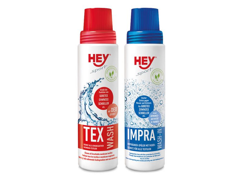 Zwei Flaschen Hey Sport Tex Wash (rot) und Impra Wash-In (blau) für atmungsaktive Funktionstextilien.