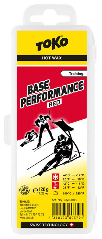 Toko Base Performance Red Skiwachs in Verpackung. Grafik mit Skifahrern. Angaben zu Temperatur und Gewicht.