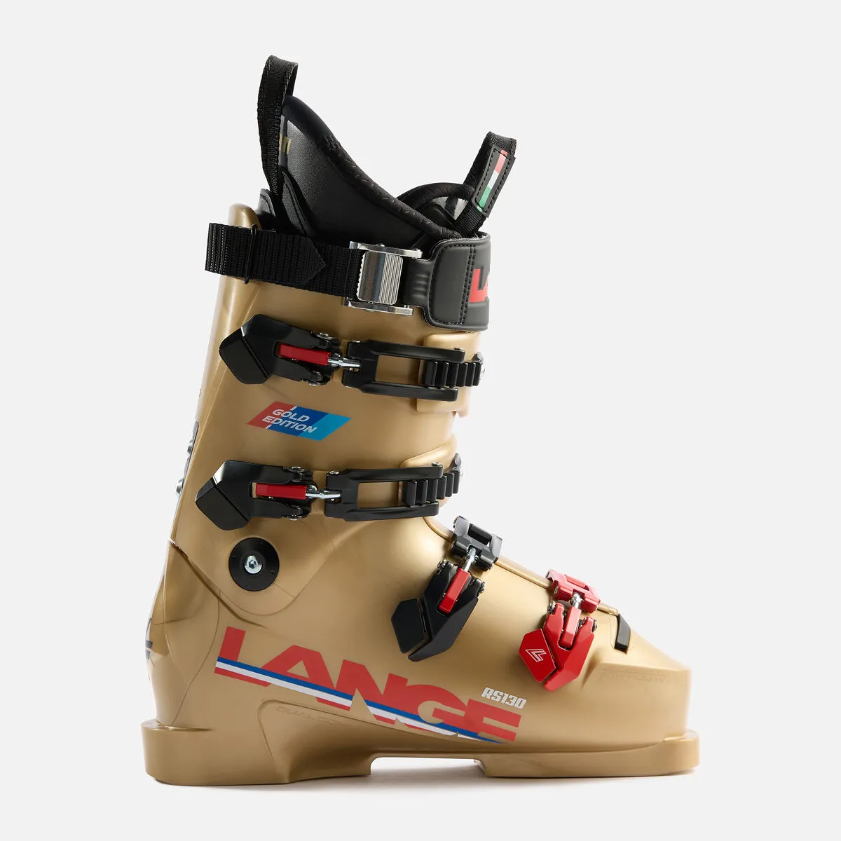 Golden ski boot of the brand Lange, side view, with black inner boot and buckles with red accents.