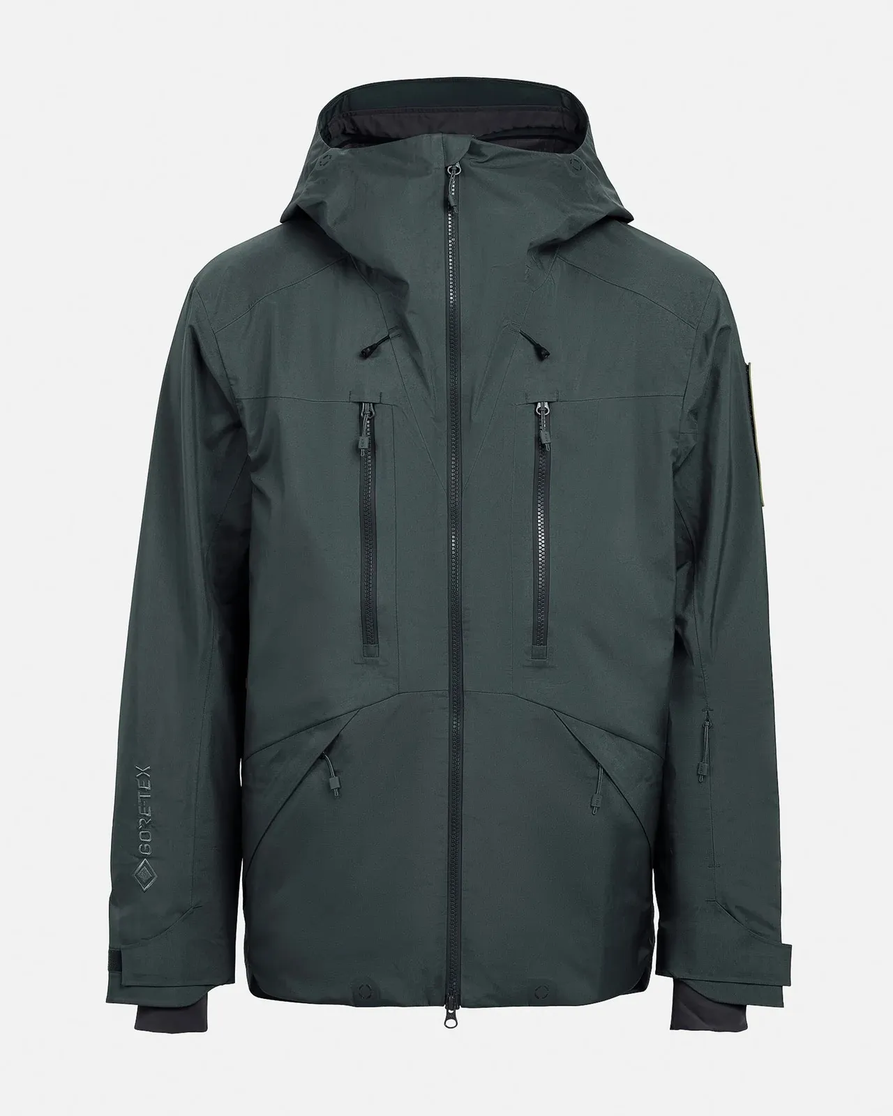 Grüne Z-2 EPE 3L Jacke Magic Forrest mit Kapuze, Reißverschlüssen und Taschen auf hellgrauem Hintergrund.
