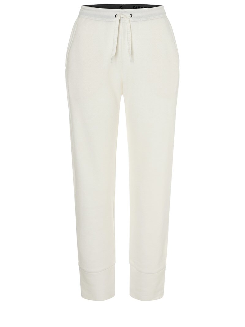 Weiße super.natural Strickhose mit Kordelzug, geradem Bein und Bündchen am Saum.