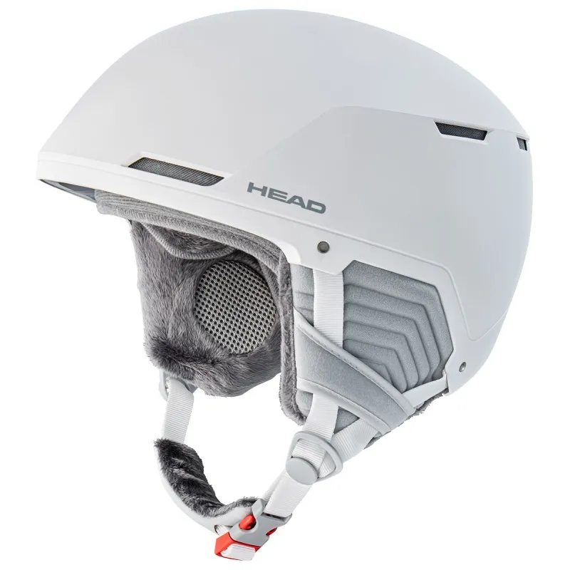 Close-up of white Head Compact Pro W ski helmet with earmuffs and chin strap.
