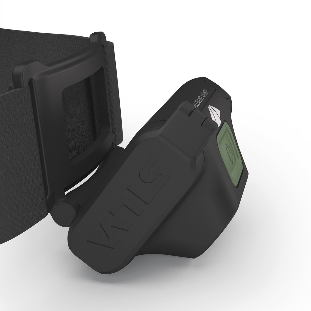 Close-up of the black Silva Scout 3X headlamp with wide headband and green power button.