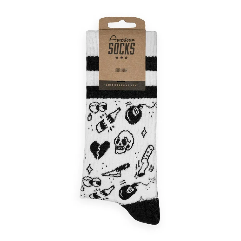 White 'Flash Tattoo - Mid High' sock with skulls, hearts, billiard balls and bottles with product packaging.