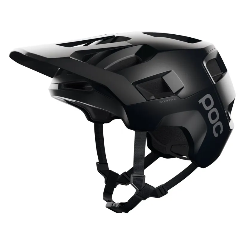 Schwarzer POC Kortal Fahrradhelm mit Visier und Kinnriemen, seitliche Logo-Platzierung.