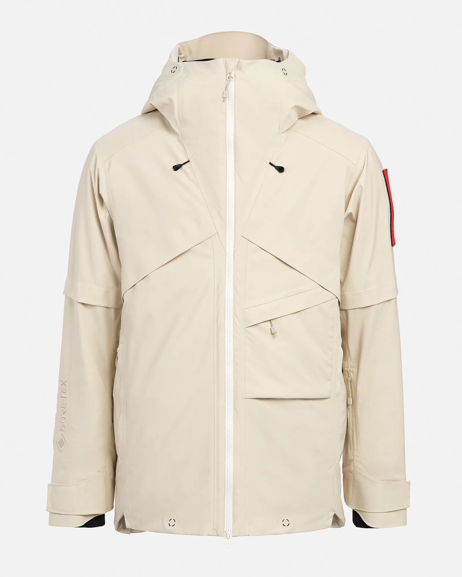 Beige Gore-Tex 2L stretch ski jacket with hood, white zipper, pockets and red detail on the arm.
