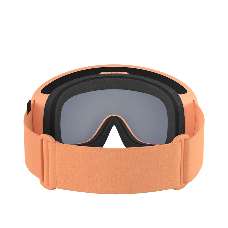 Peach-colored ski goggles with grey lenses, black padding and adjustable strap, front view.