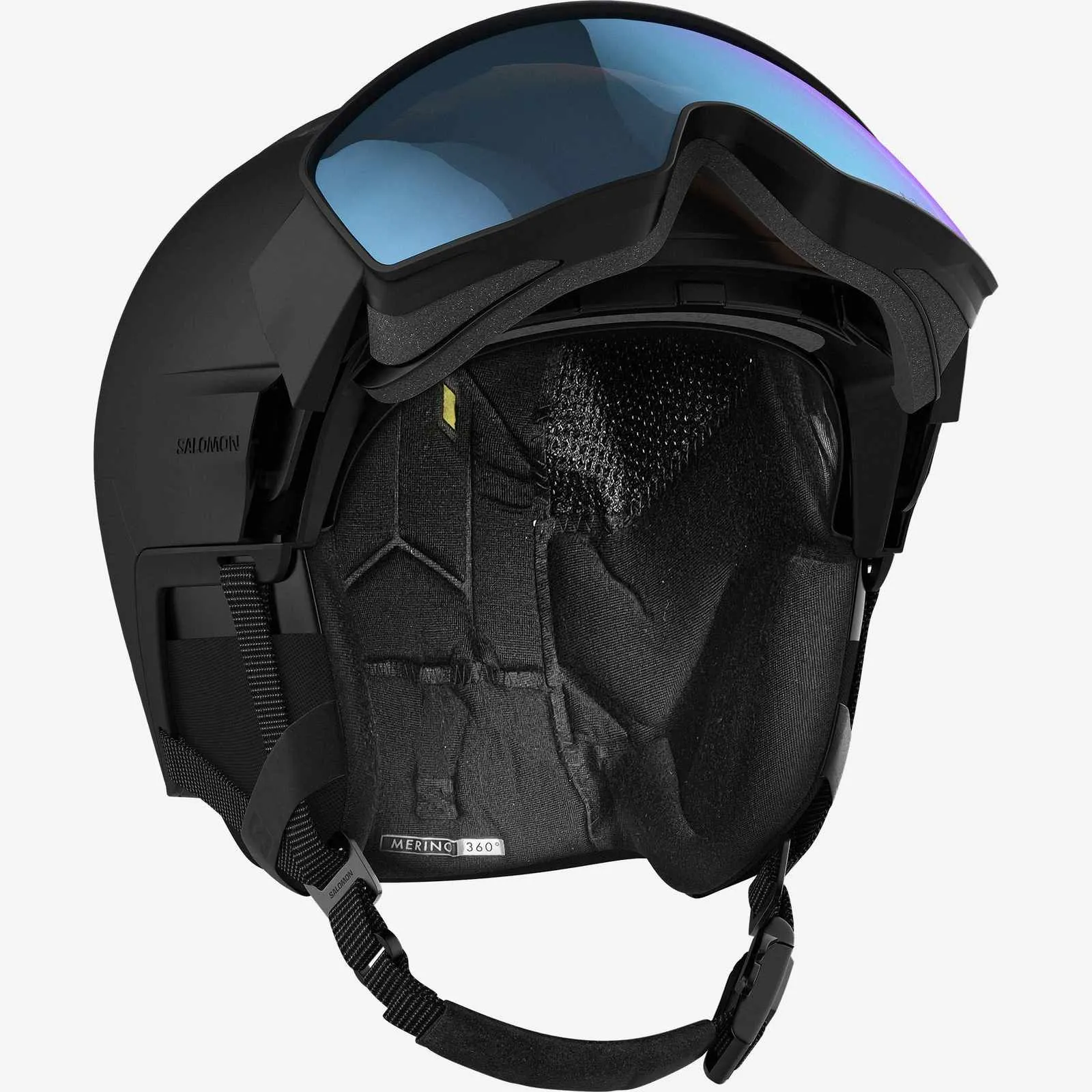 Schwarzer Salomon Driver Prime Sigma Photo MIPS Skihelm mit blau getöntem Visier und verstellbarem Kinnriemen.