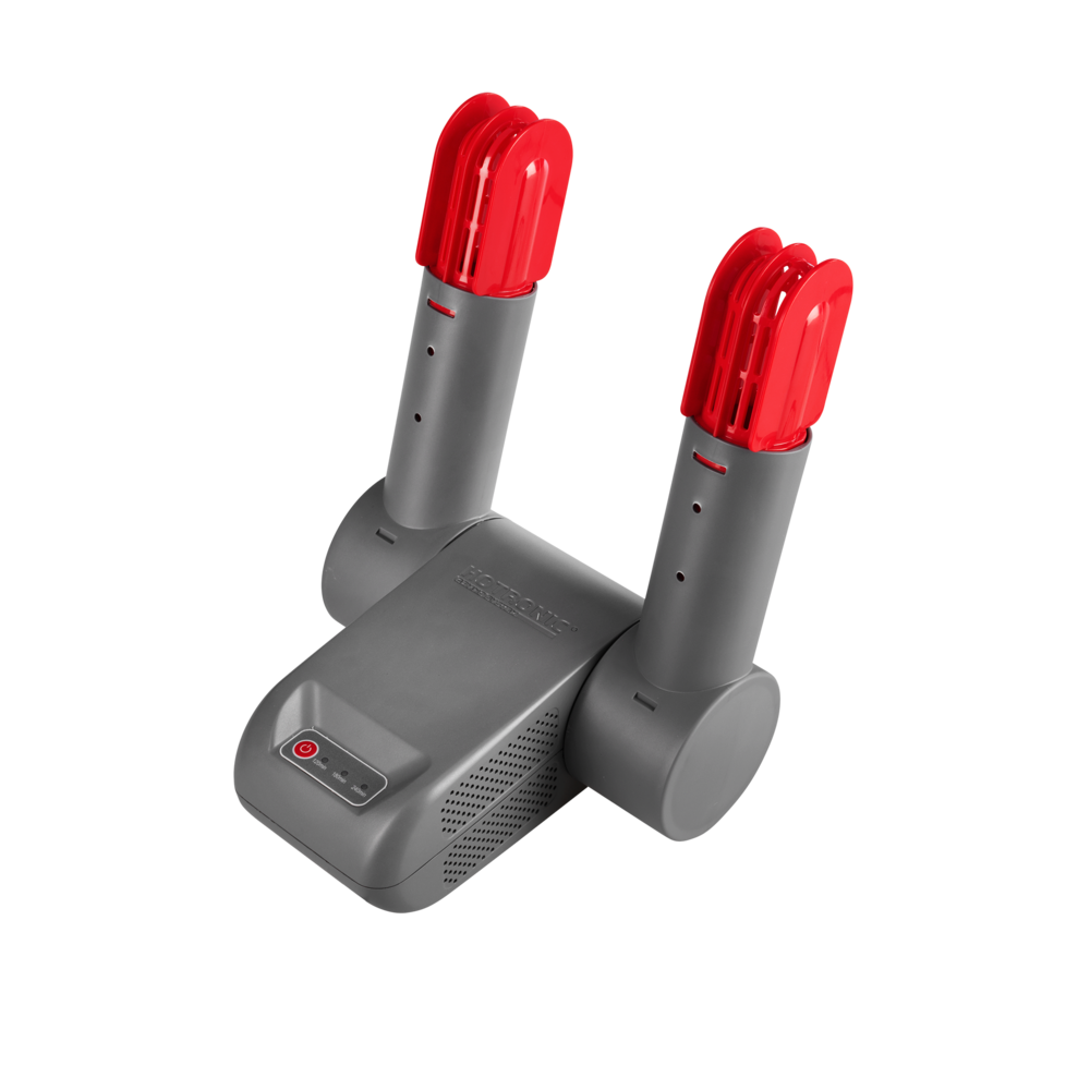 Graues Schuh-Trocknungsgerät Ein graues Schuh-Trocknungsgerät mit roten Einsätzen auf weißem Hintergrund.