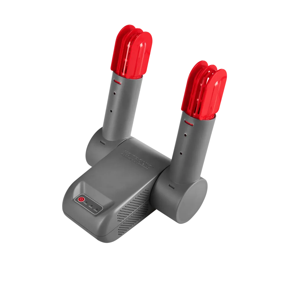 A gray shoe drying rack with red inserts on a white background.