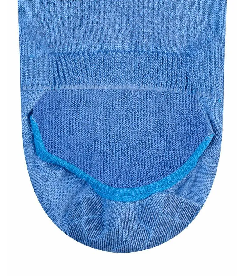 Close-up of a light blue ladies' sock in a rib pattern with reinforced toe.