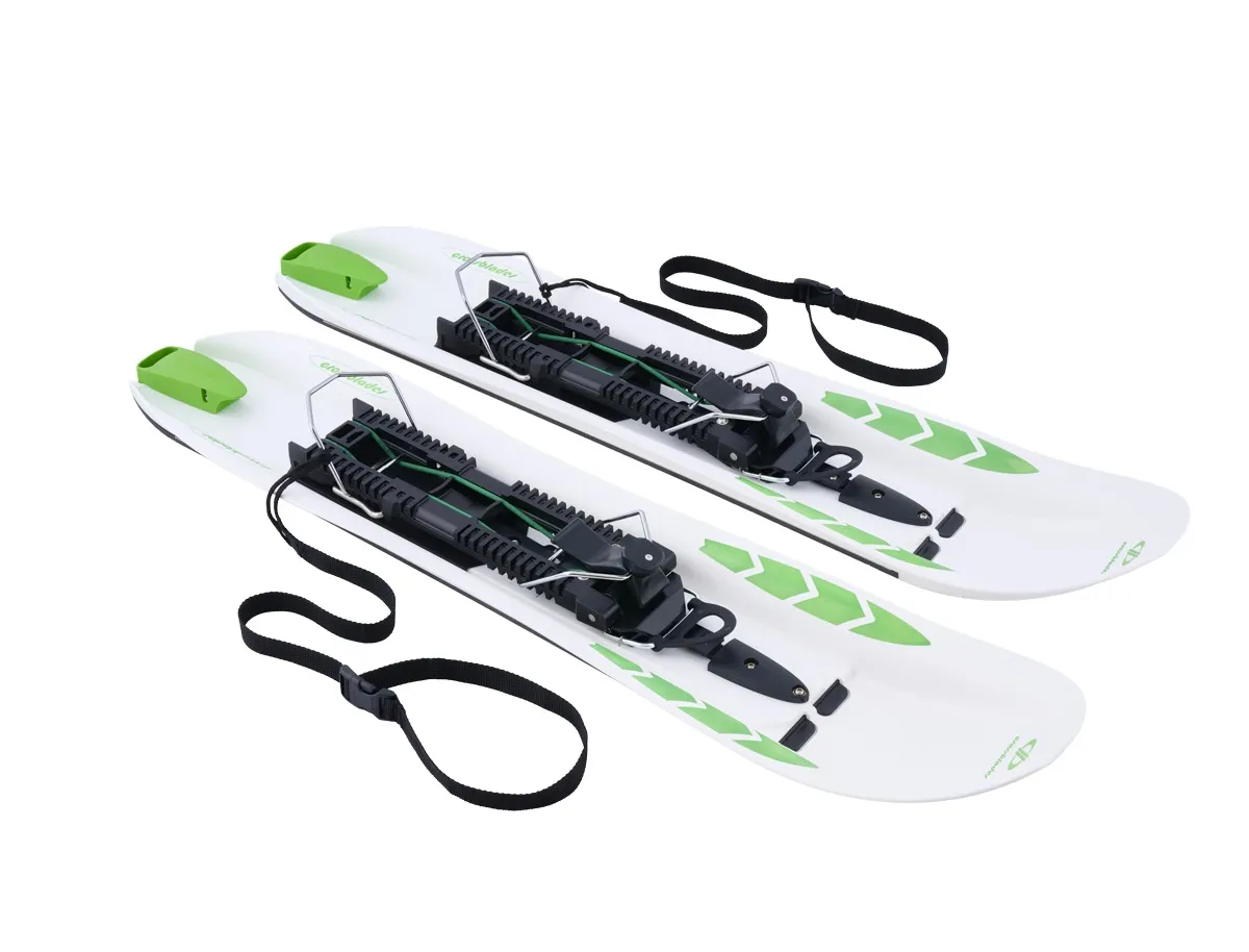 Two Crossblades hardboots, white with green accents, bindings and straps on a white background.