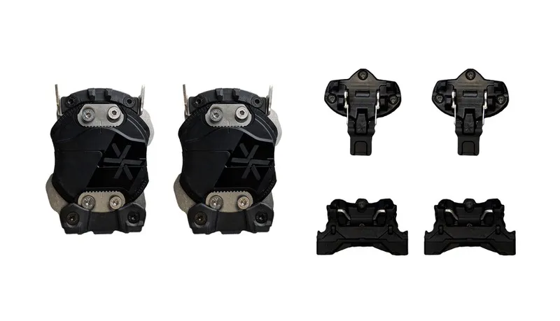 Two Karakoram Ultra Ranger splitboard bindings and interface parts on white background.