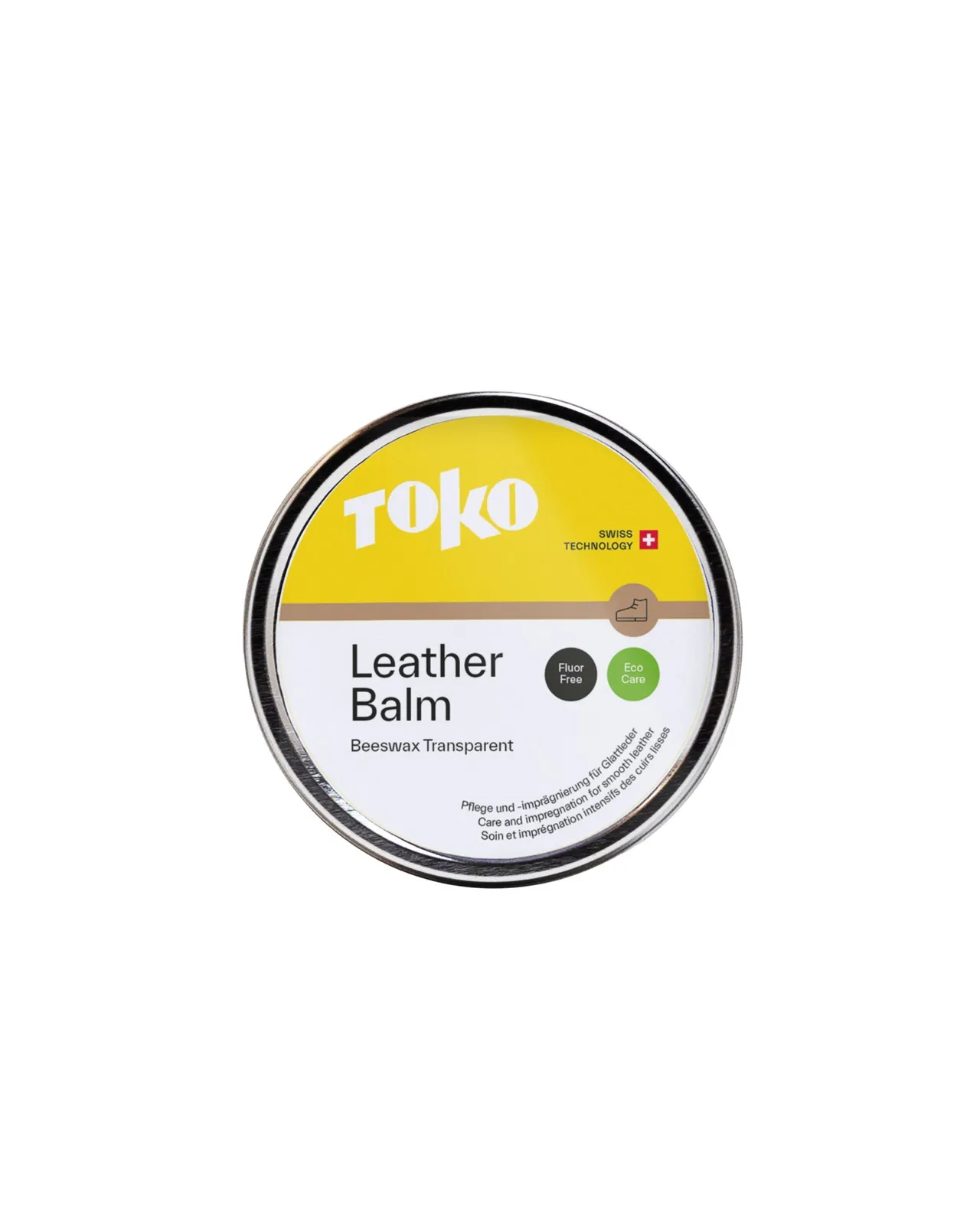 Contenitore rotondo di colore argento con un'etichetta gialla con il testo "Toko Leather Balm". Il prodotto è trasparente e contiene cera d'api.