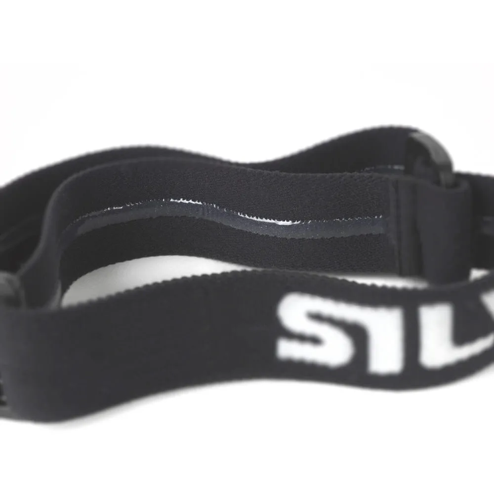 Detailed view of the anti-slip headband of the Silva Scout 3X headlamp. The strap is black, the "Silva" lettering is in white.