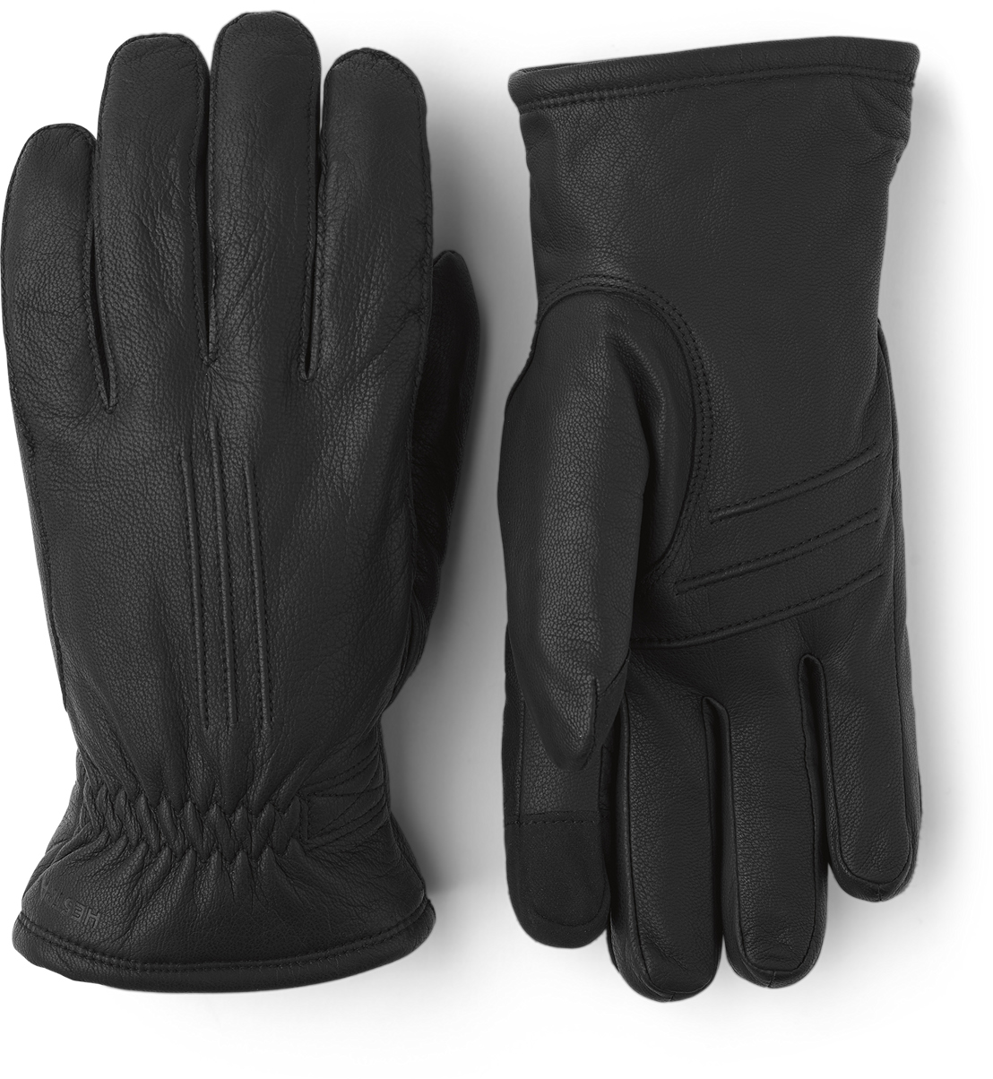 Two black leather gloves lying next to each other, one with the palm facing upwards, the other with the back of the hand facing upwards.
