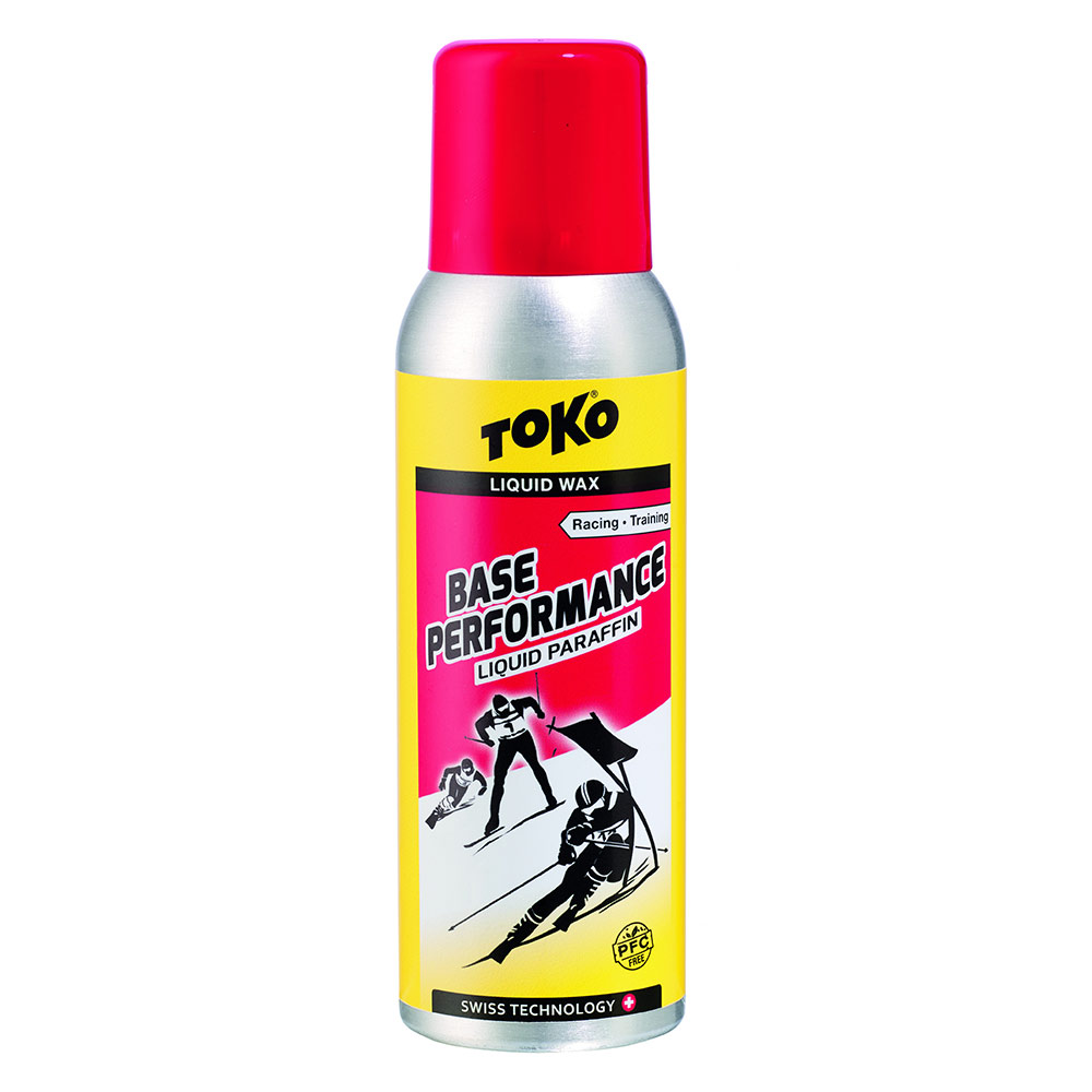 Silberne Dose mit rotem Deckel. Etikett: Toko Base Performance Liquid Paraffin Red mit Ski-Rennläufern.