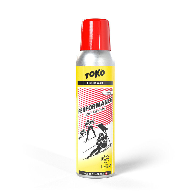 Eine Dose Toko Performance Liquid Red Skiwachs, mit rotem Deckel, gelbem Etikett und Skifahrer-Illustration.