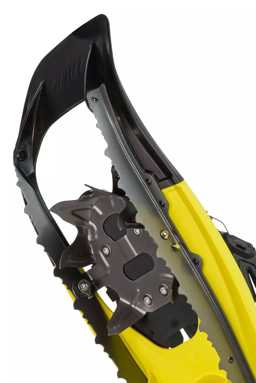 Close-up of a yellow Tubbs VRT 25 men's snowshoe. Crampons and spikes are clearly visible.