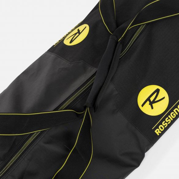 Schwarzer Rossignol Soul Skisack mit gelbem Logo, Tragegriffen und Reißverschluss.
