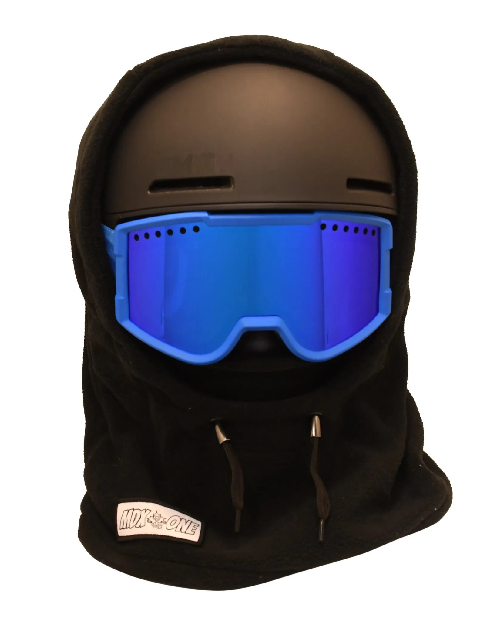 Black children's balaclava made of soft polar fleece, shown over a black ski helmet and blue ski goggles. Covers head, neck, and face for optimal cold protection—ideal for skiing and winter days. Bottom left: white "MDX-ONE" label.