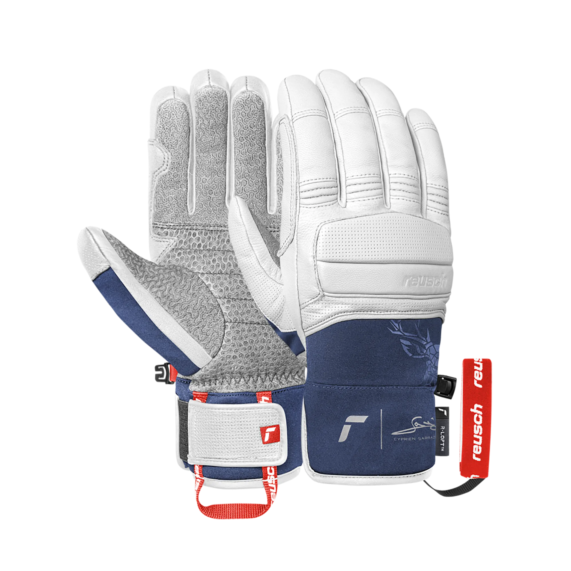 Two ski gloves from Reusch, white leather with dark blue accents and a floral pattern, set against a white background.