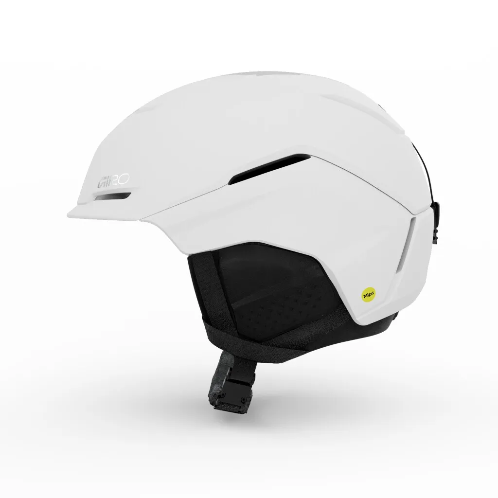White ski helmet, side view, with black chin strap and yellow MIPS sticker.