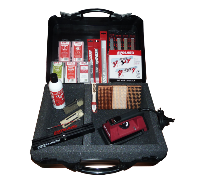 Boîte à outils professionnelle MT 07 Boîte professionnelle noire MT 07 ouverte contenant des outils tels que des limes, de la cire, des brosses, des étaux et un fer à repasser numérique.