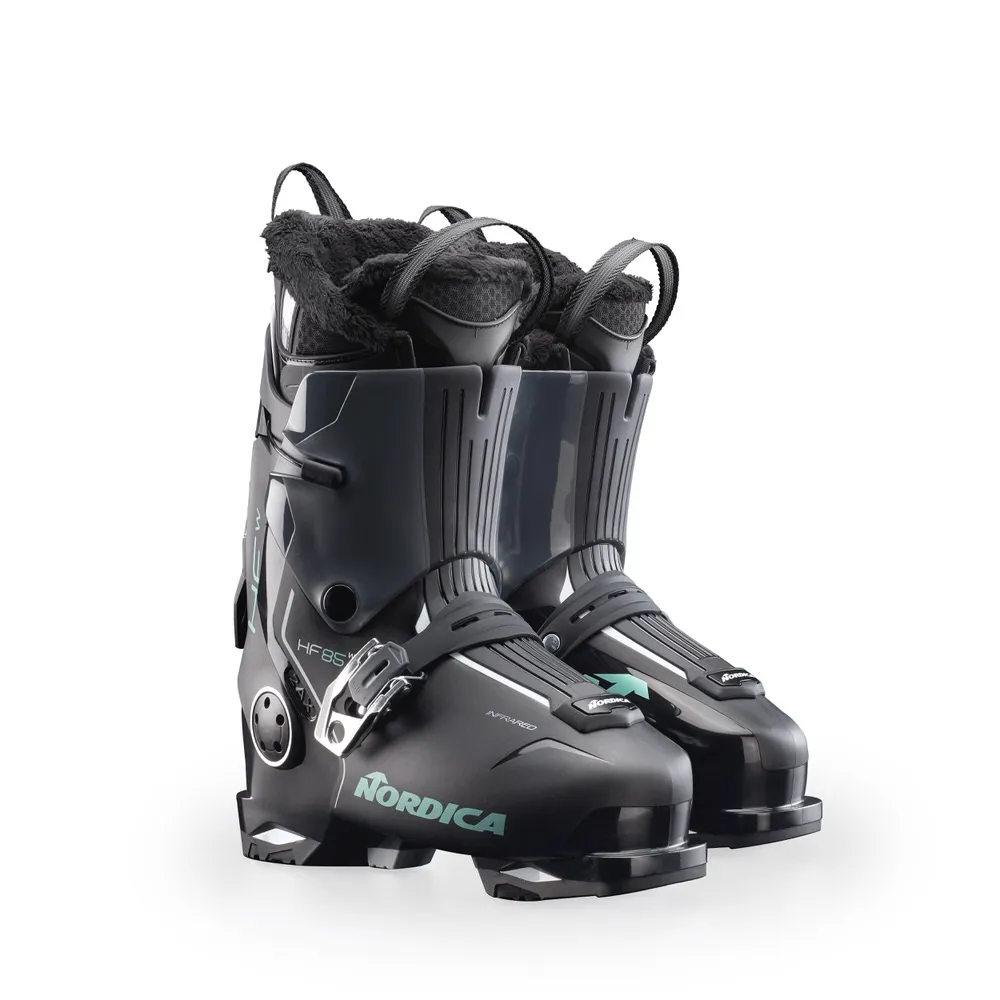 Black Nordica HF 85 W GW ski boots with green-anthracite accents, insulated on a white background.