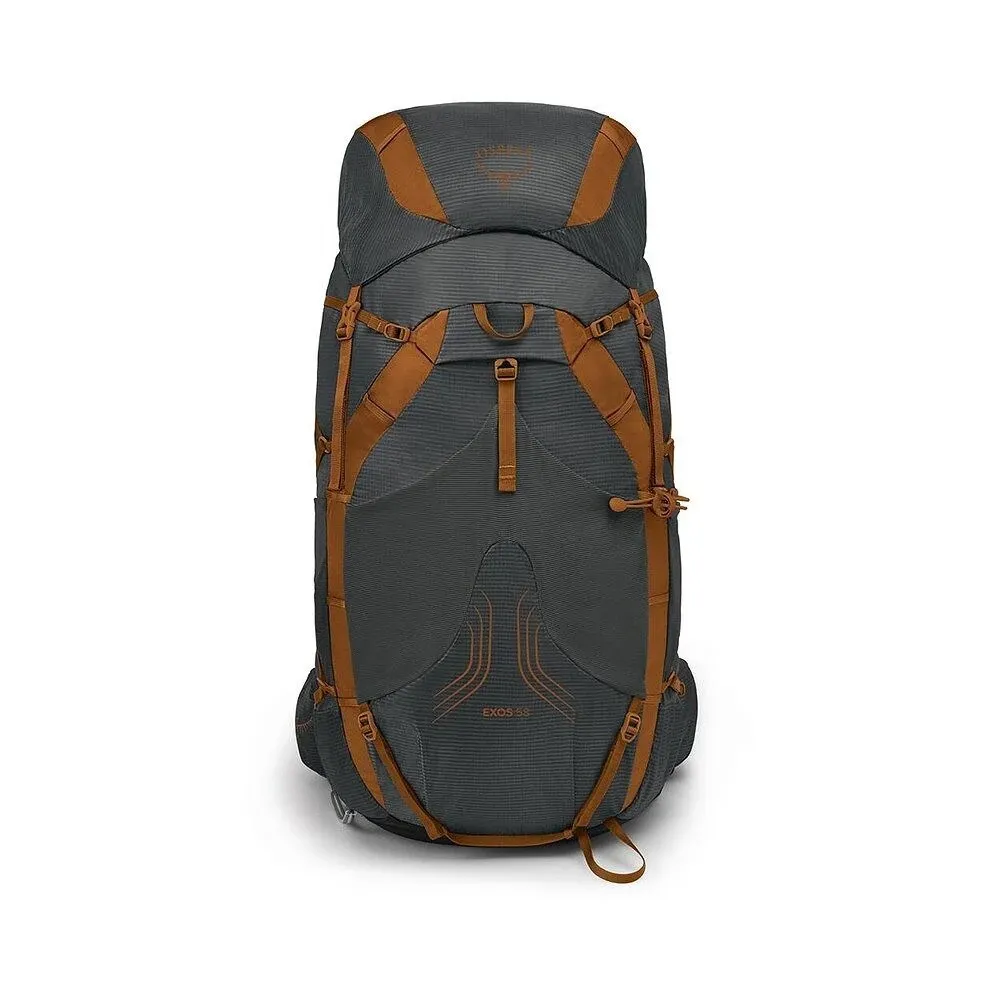 A gray hiking backpack with brown accents stands upright. It features a top-loading design with multiple adjustable straps and attachment points. The model name "EXOS 58" and the Osprey logo are visible. It is well-suited for multi-day trips.